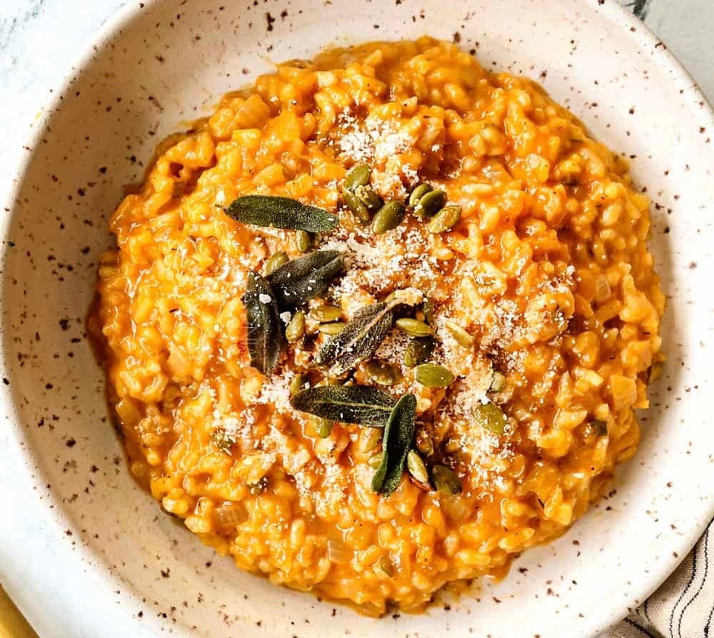 Pumpkin Risotto with Taleggio Fondue, Chicken Jus and Toasted Almonds