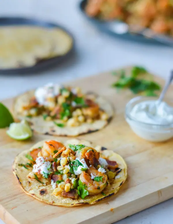 Street-Style Shrimp Tacos with Corn, Bacon and Lime Crema